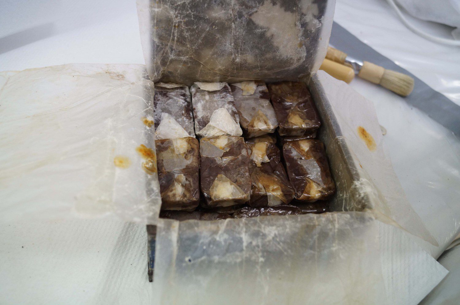 Repacking the Lime Juice Nodules into the tin after treatment ̶ as the chocolate threatened to melt at room temperature, treatment had to be carried out in short bursts between periods of cold storage.