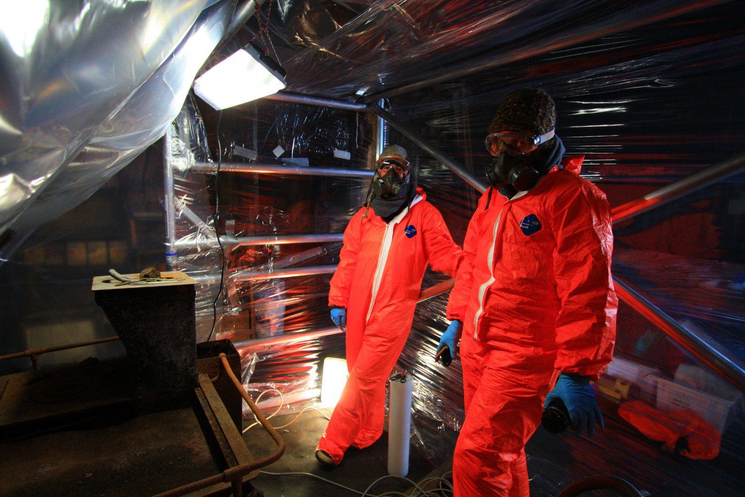 Conservators work with Cape Evans Hut