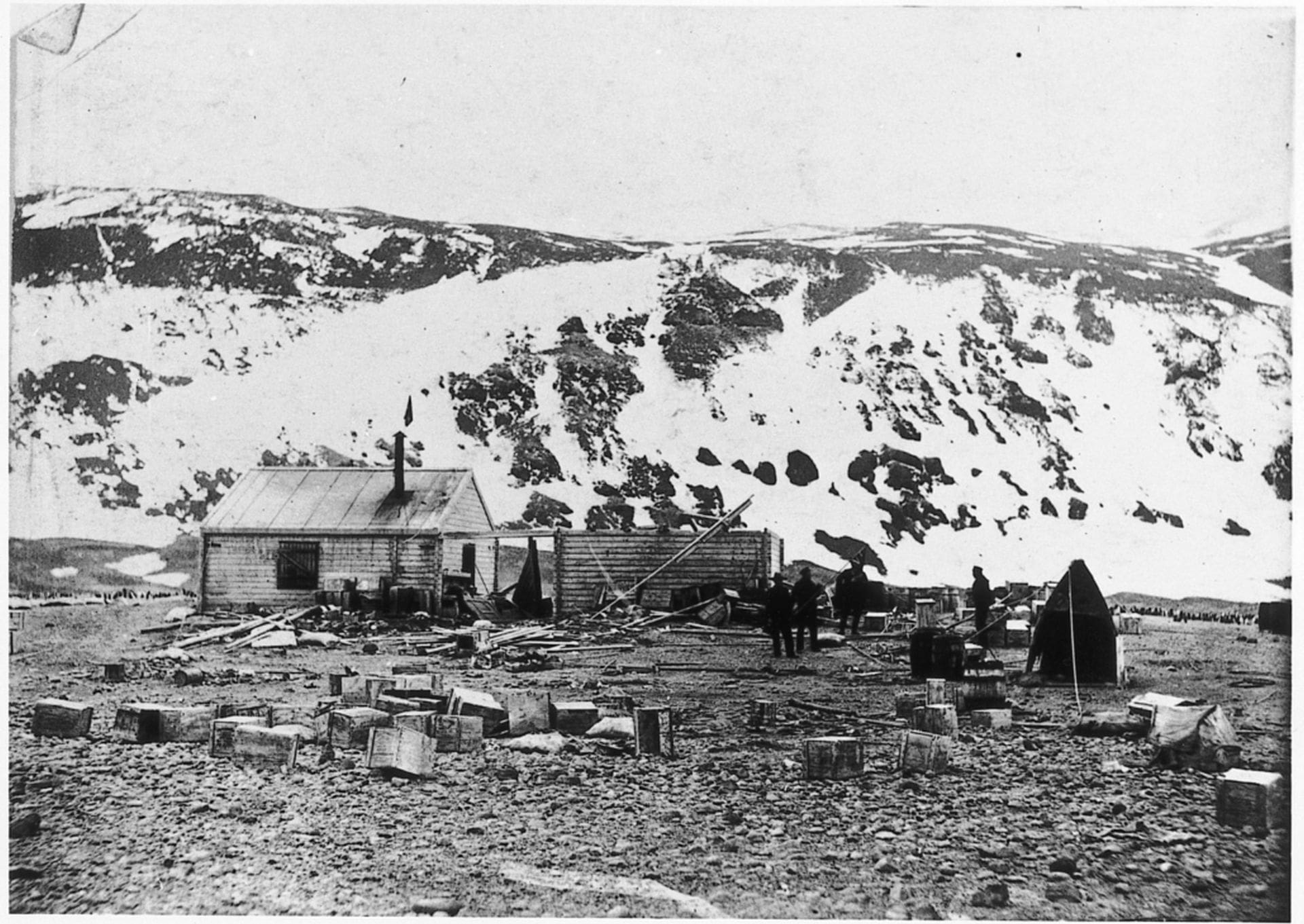 The huts as photographed on the arrival of the Scott's Discovery expedition at Cape Adare in 1902.