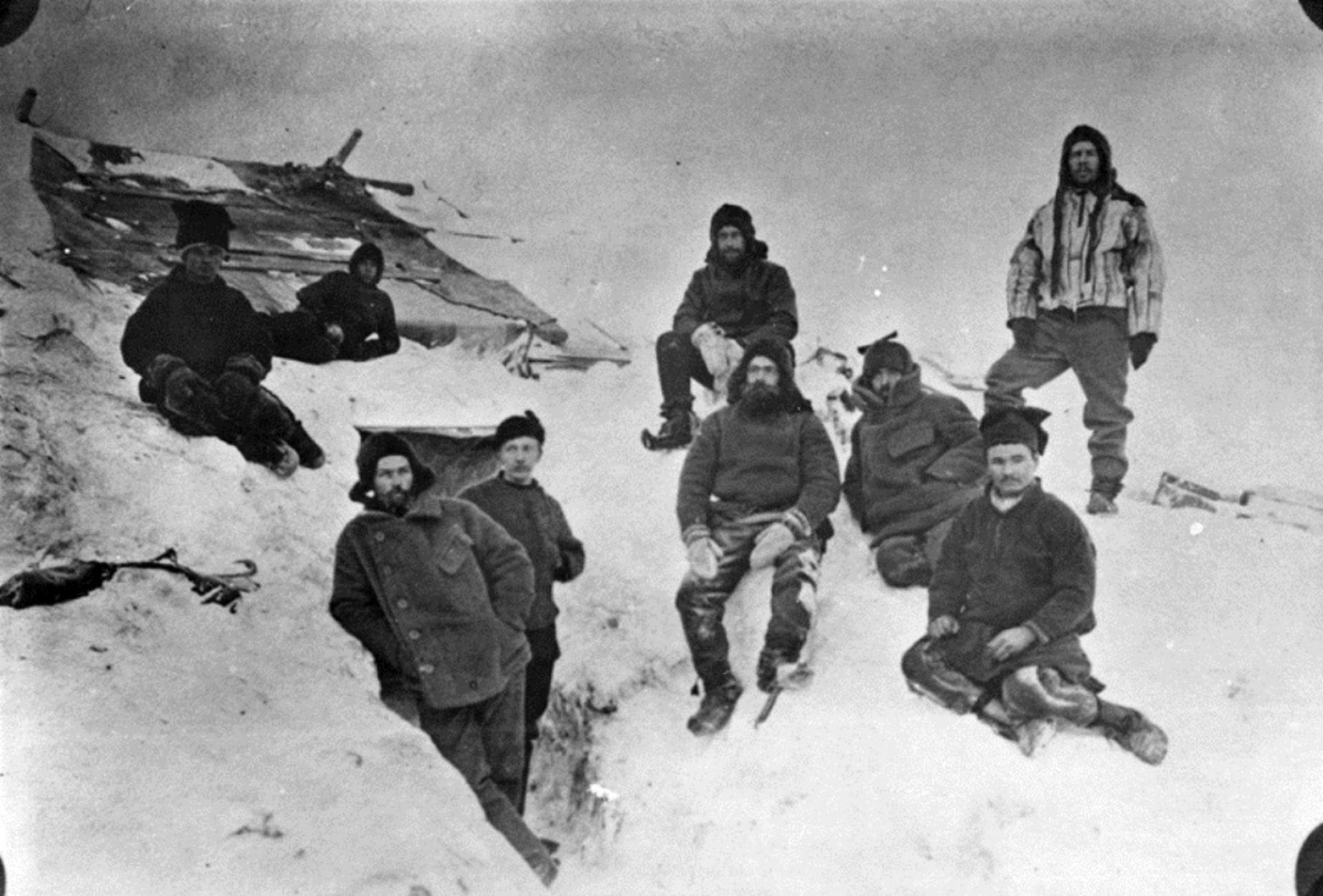 The expedition members pictured just before spending the first winter on the Antarctic continent, 1899.