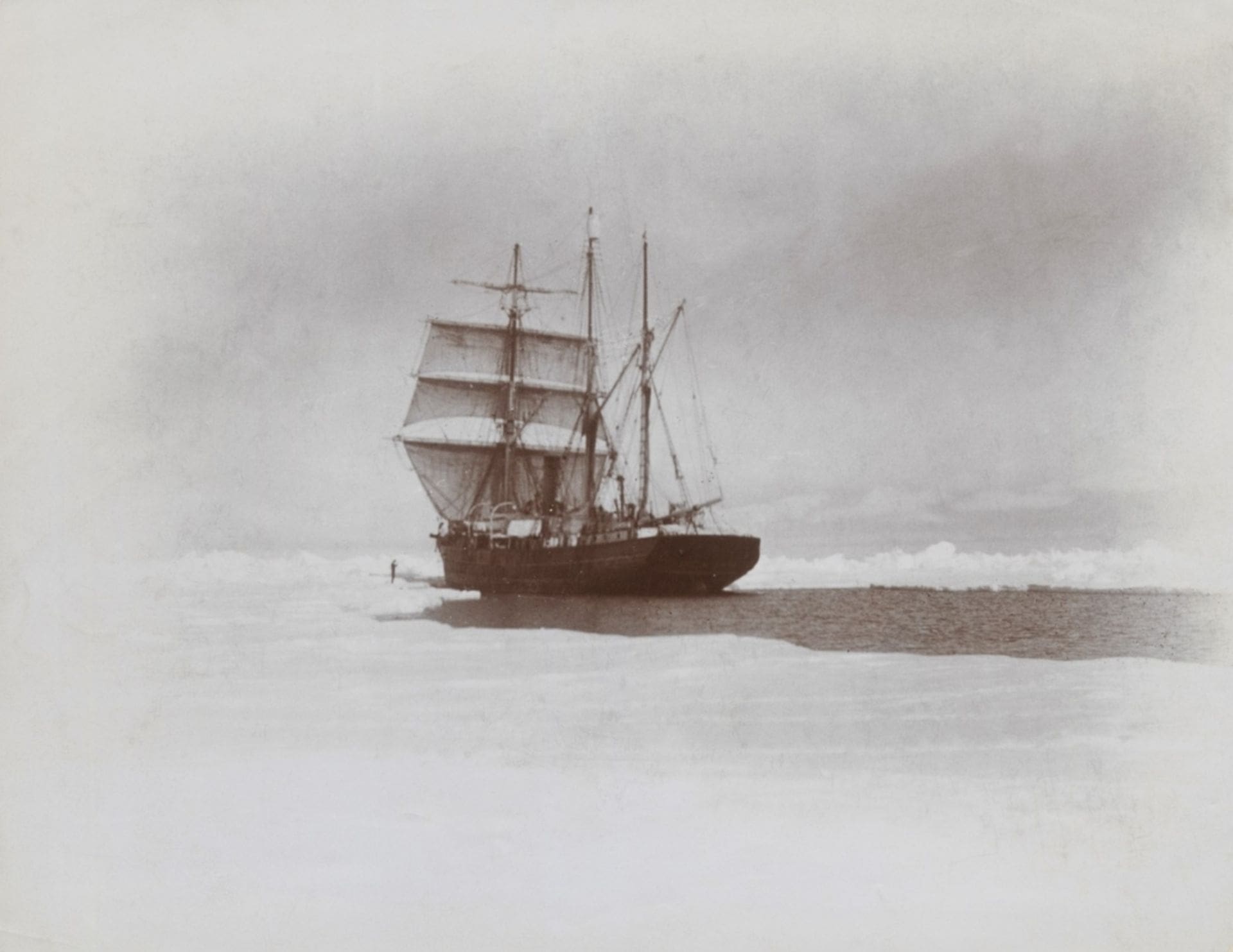 The Nimrod, under sail and steam, forcing her way through the pack ice towards Cape Royds