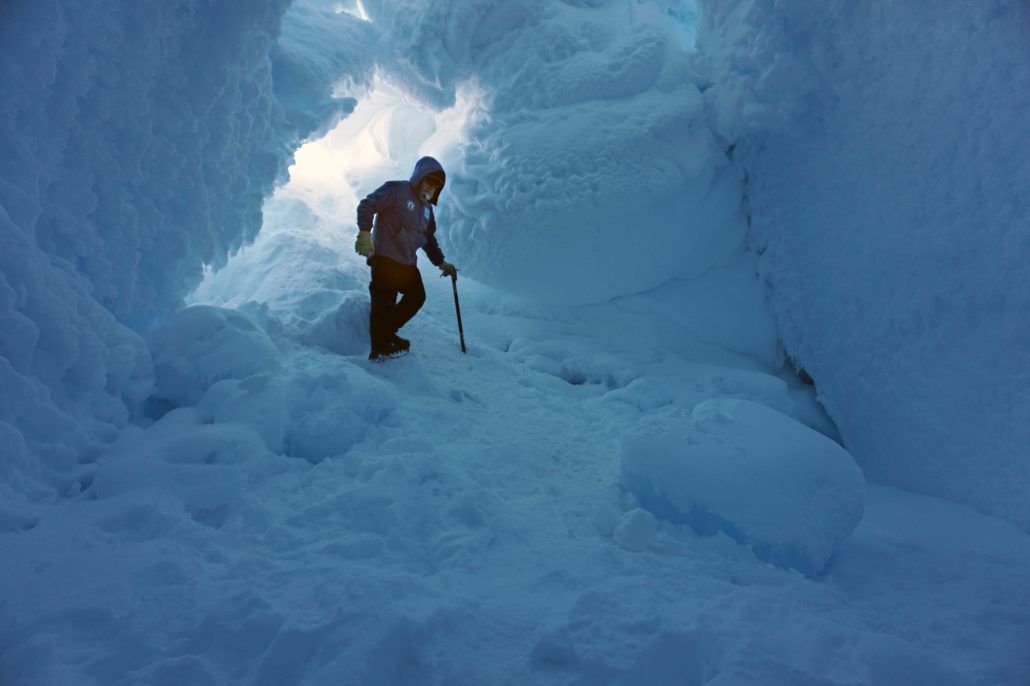 Al Fastier descending into the ice cave n the Erebus Glacier tongue.