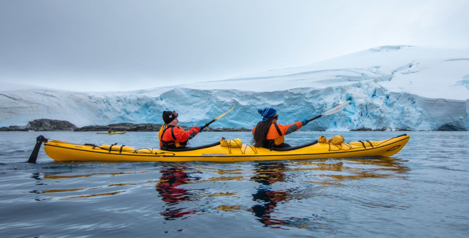 Jaylee and Shauna Kayaking in Antarctica